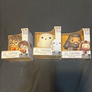 Harry Potter Wizarding World 4” Vinyl Figure Set Harry, Hedwig, and Hagrid